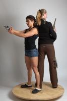2021 01 OXANA AND XENIA STANDING POSE WITH GUNS (2)